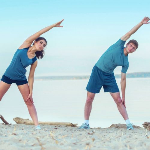 stretching on beach